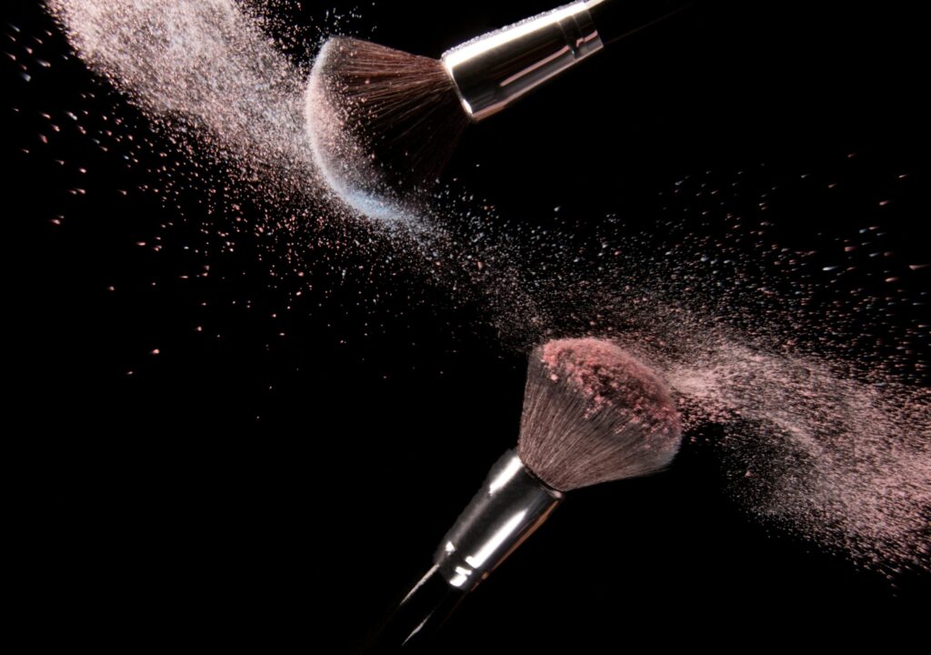 Cosmetics Makeup Brushes and Powder Dust Explosion